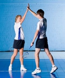 Players are celebrating after a badminton match